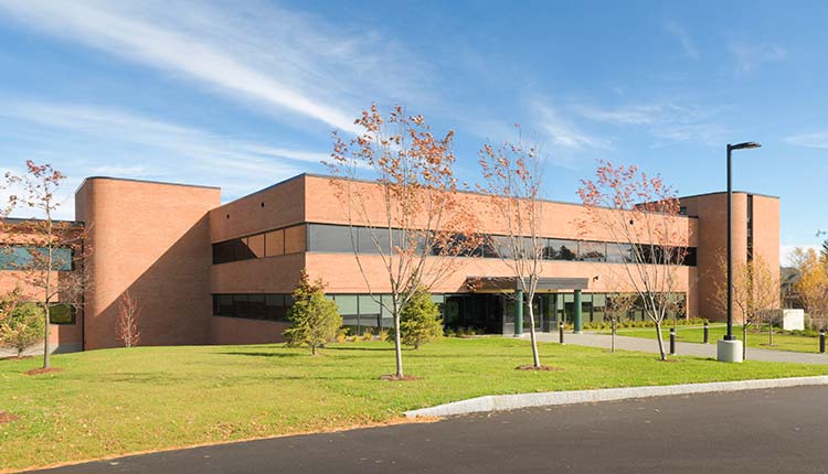 This 39,368 SF project involved a significant amount of open office space and a connecting link to a twin office building (behind, not shown) built by HP Cummings in 1992. Our work included geotherm mechanical design. Substantially completed within 11 months.