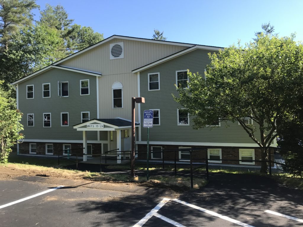 This project included extensive building envelope improvements of 24 units, new windows, doors, energy efficiency upgrades, heating system upgrade, roof replacement, new carport, paving and drainage along with site work improvements.